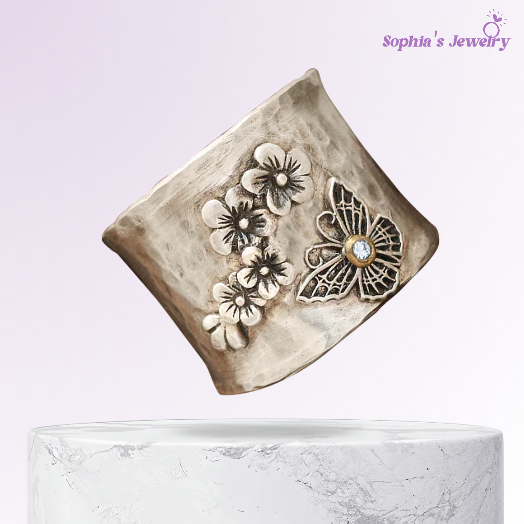 Lyndie | Anillo de plata con diseño floral y mariposas