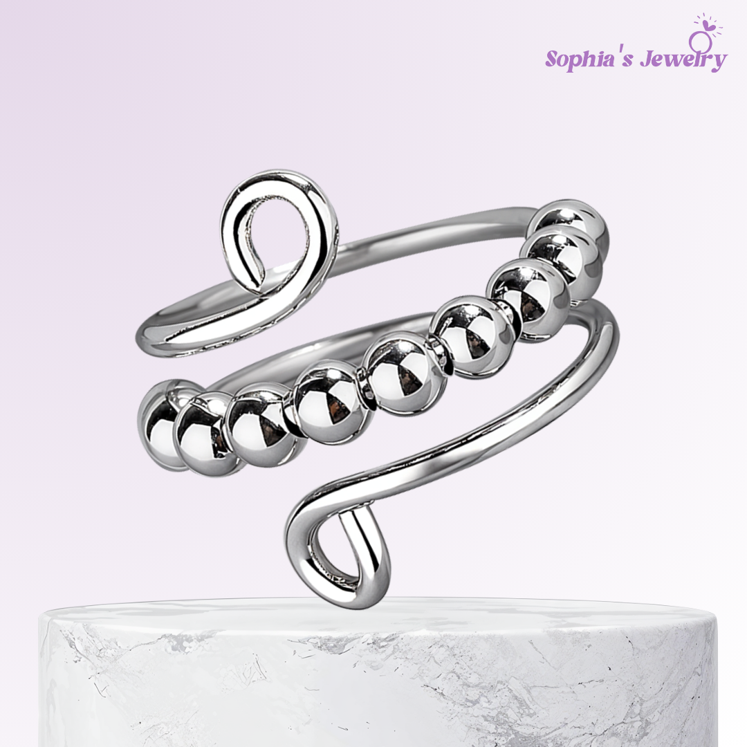 Nova | Anillo plateado con diseño ondulado y cuentas circulares