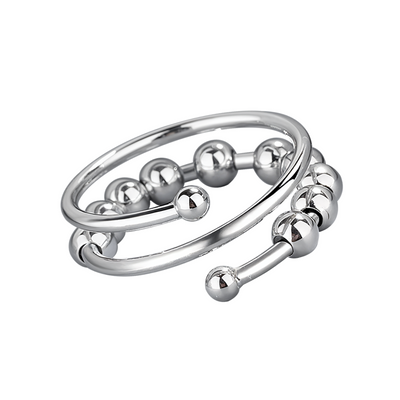 Nova | Anillo plateado con diseño ondulado y cuentas circulares