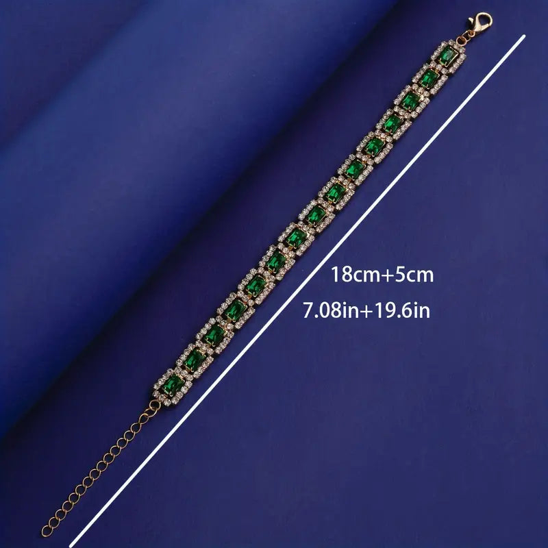 Pulsera de oro con declaración verde esmeralda