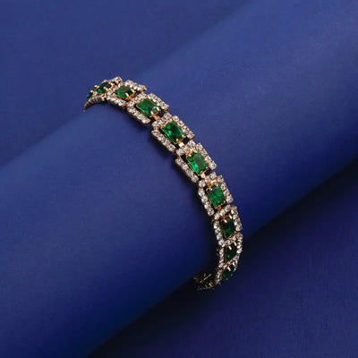 Pulsera de oro con declaración verde esmeralda